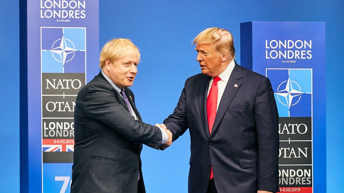 Donald Trump and Boris Johnson shake hands at theNATO Leaders' Meeting