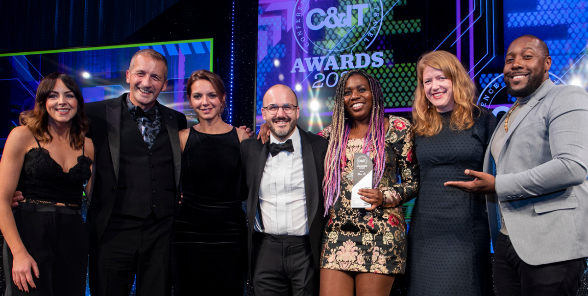 The Identity team collecting an award