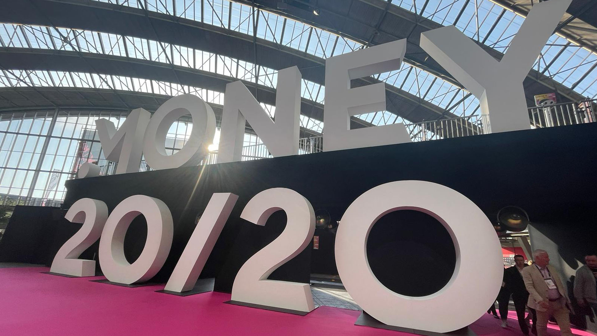 Huge Money 20/20 logo at the exhibition entrance