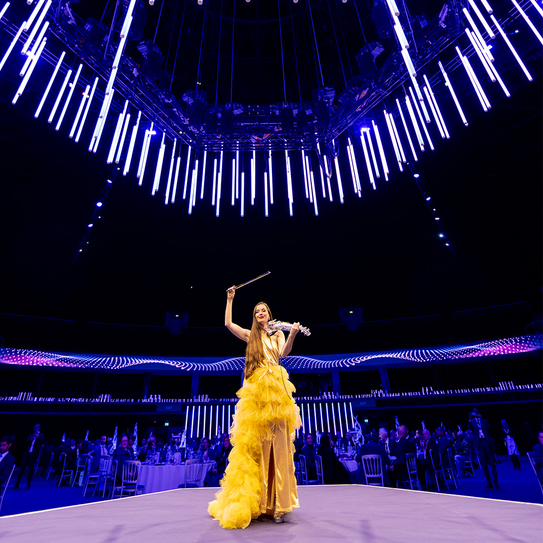 Violinist on stage at a gala dinner