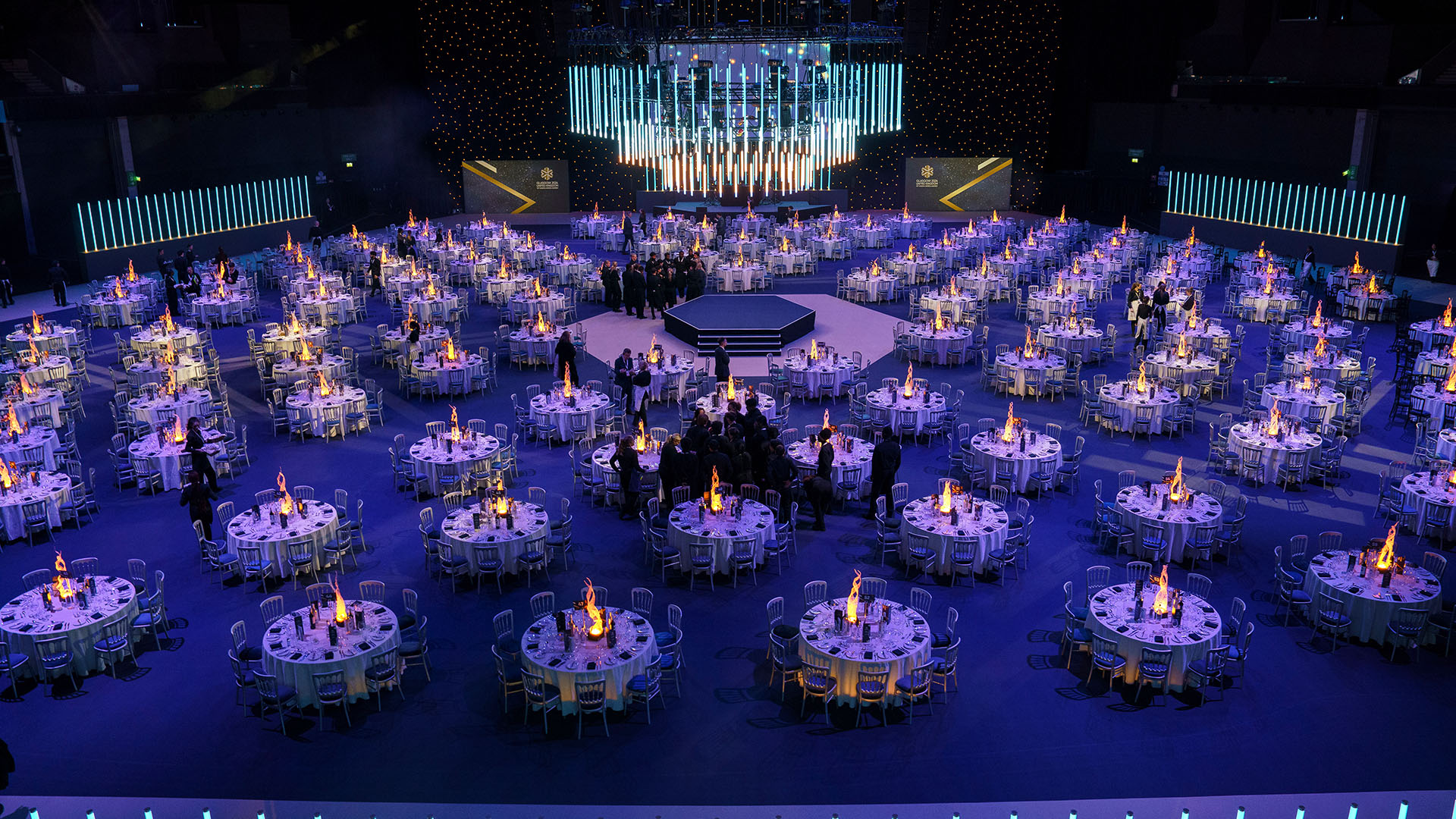 Aerial view of a room set up for a gala dinner