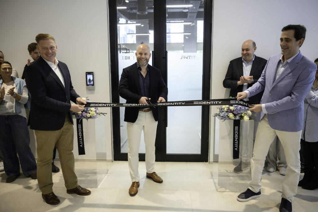 Ribbon cutting: (L-R) Dr. Ray Tinston, Michael Gietzen, Olivier Vallee